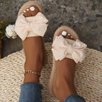 Women’s Flat Slip-On Sandals with Bow Detail
